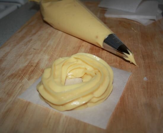 Use a pastry bag and a 1/2" star tip to pipecreate the doughnuts French Crullers with Honey Glaze